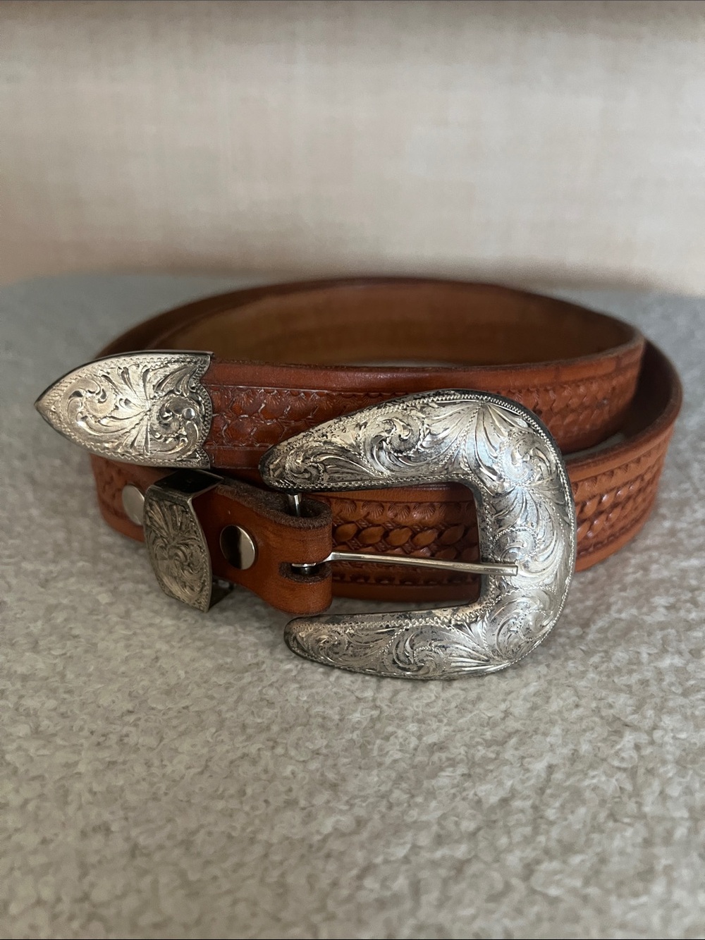 Western style belt with sterling silver overlay